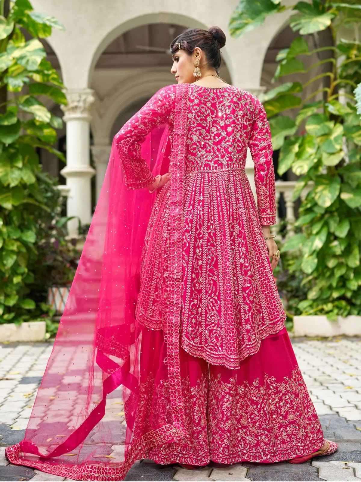 Tarani pink chinon dress back view with detailed mirror embroidery and elegant flare