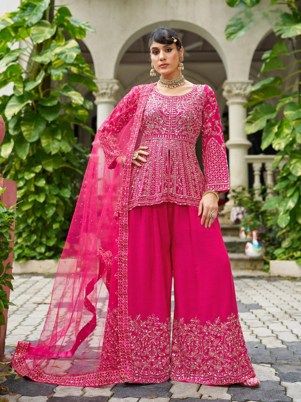 Tarani pink chinon party dress with full view showcasing real mirror embroidery and sharara set