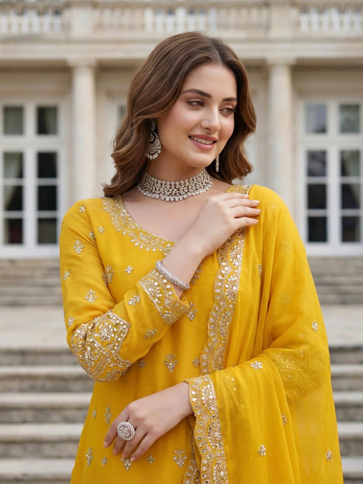 Tarani premium yellow chinon silk dress close-up showing neckline and sleeve embroidery