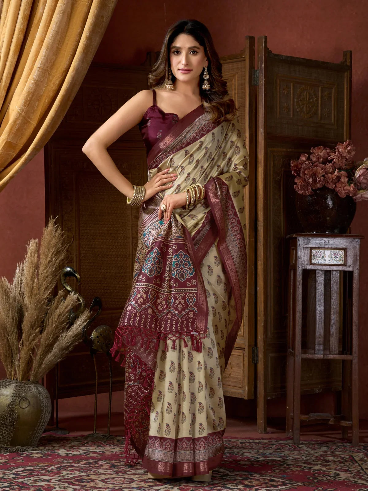 Tarani beige ajrak print saree full view with jacquard border and tassel