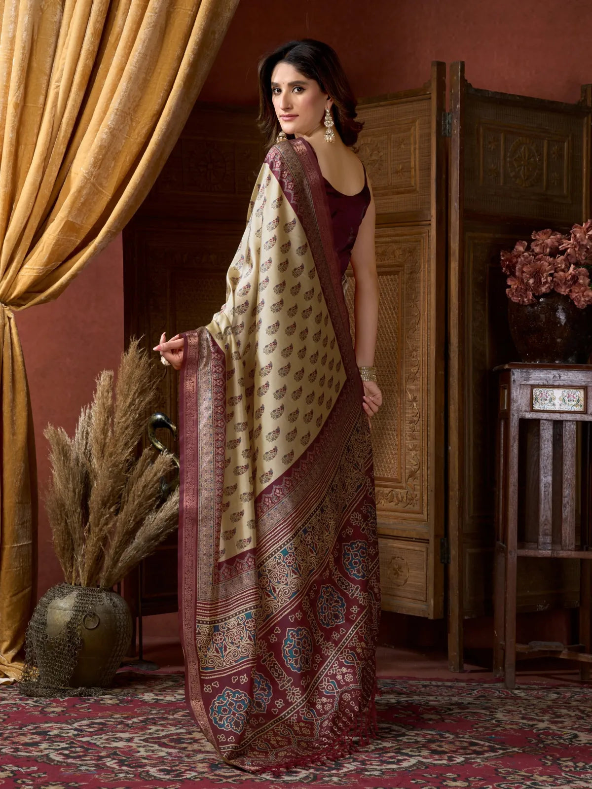 Back view of Tarani ajrak print saree showing pallu fall and blouse from behind