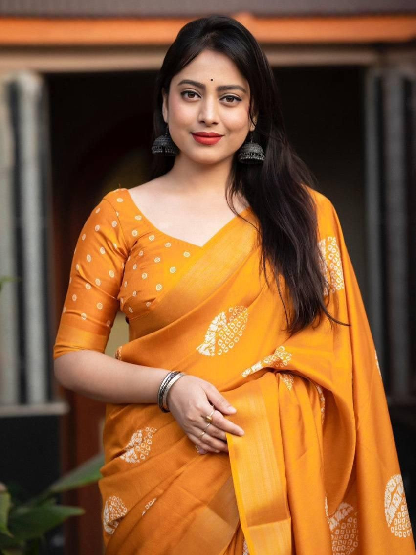 Tarani mustard cotton crape Batik saree upper body view with traditional jewelry