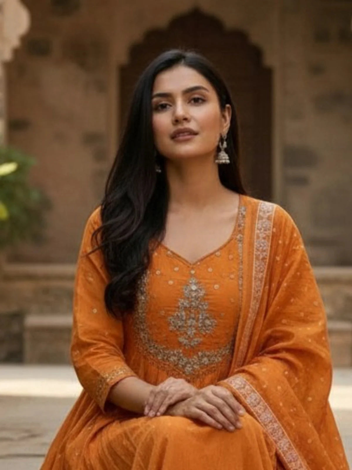 Tarani close-up orange embroidered cotton dress upper body with neckline work