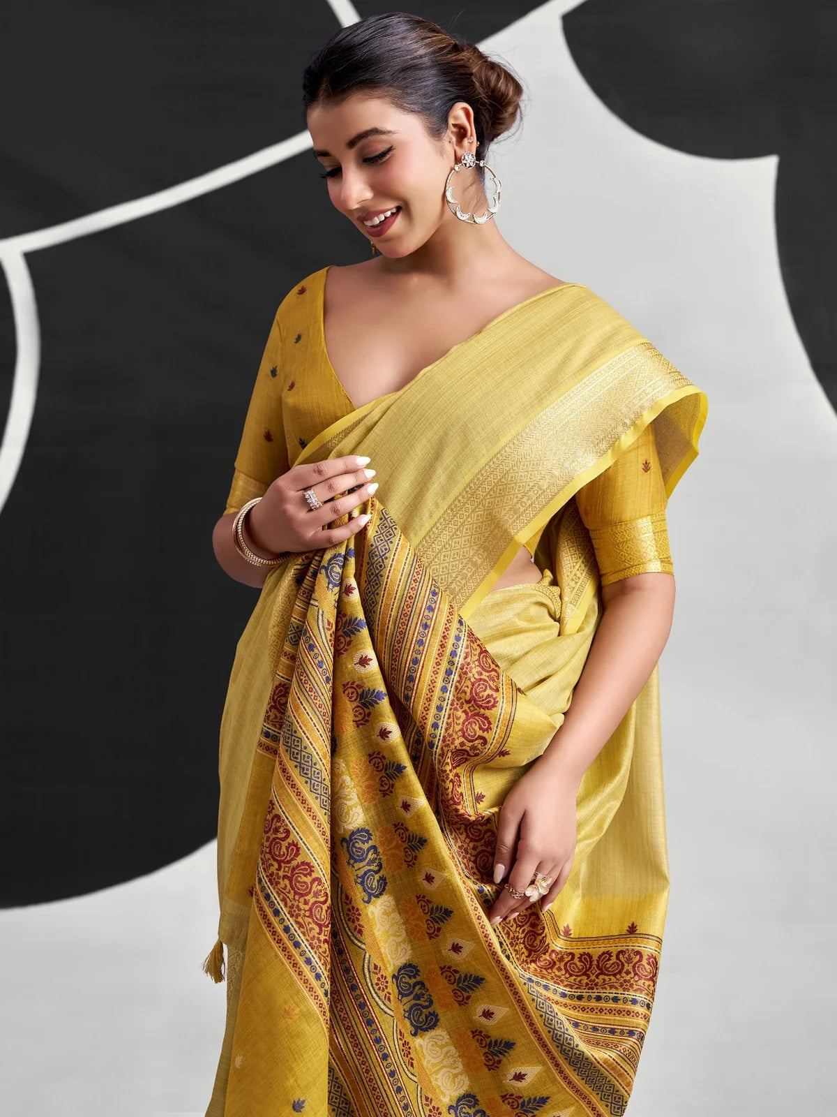 Tarani mustard cotton modal saree pallu-view with woven border and contrasting printed pallu