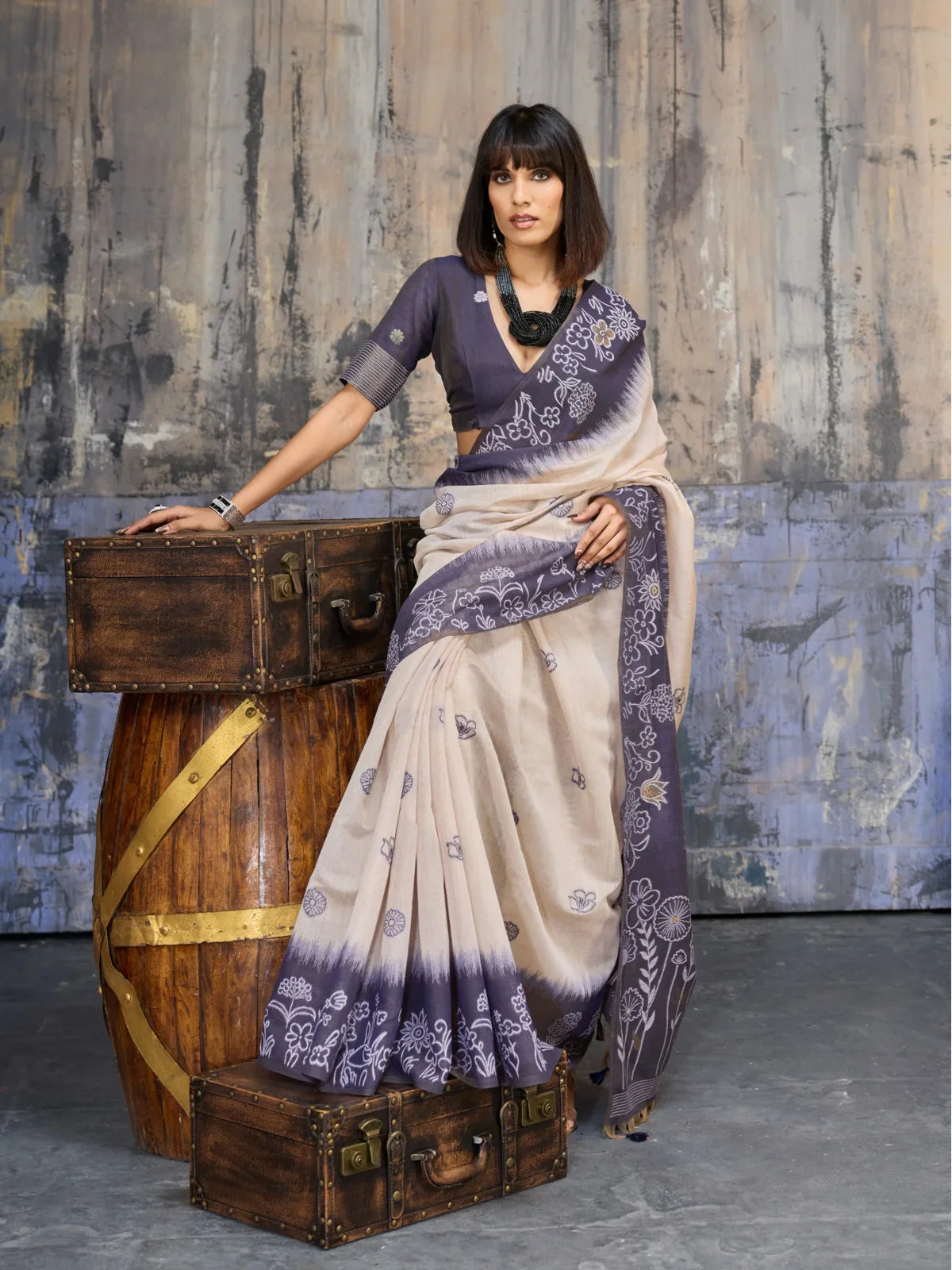 Tarani beige cotton saree full view with floral weave and soft drape for everyday elegance