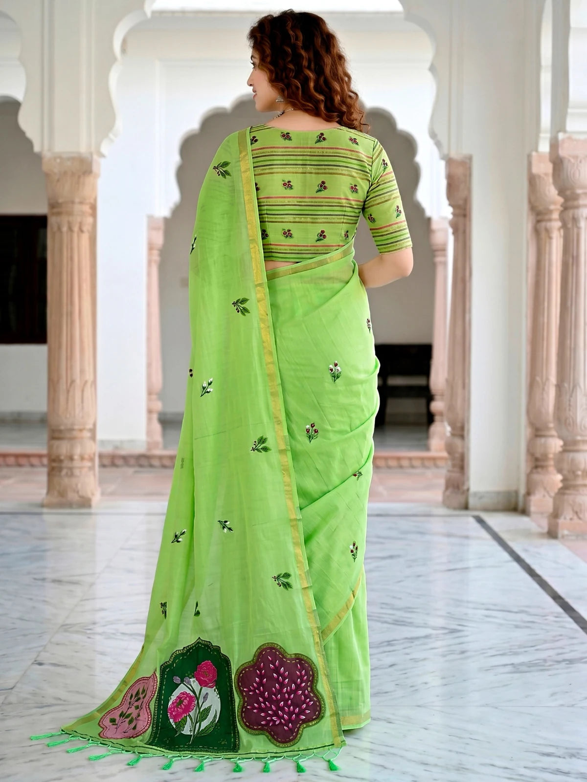 Tarani Nistha green cotton saree back view showcasing blouse pattern and pallu details