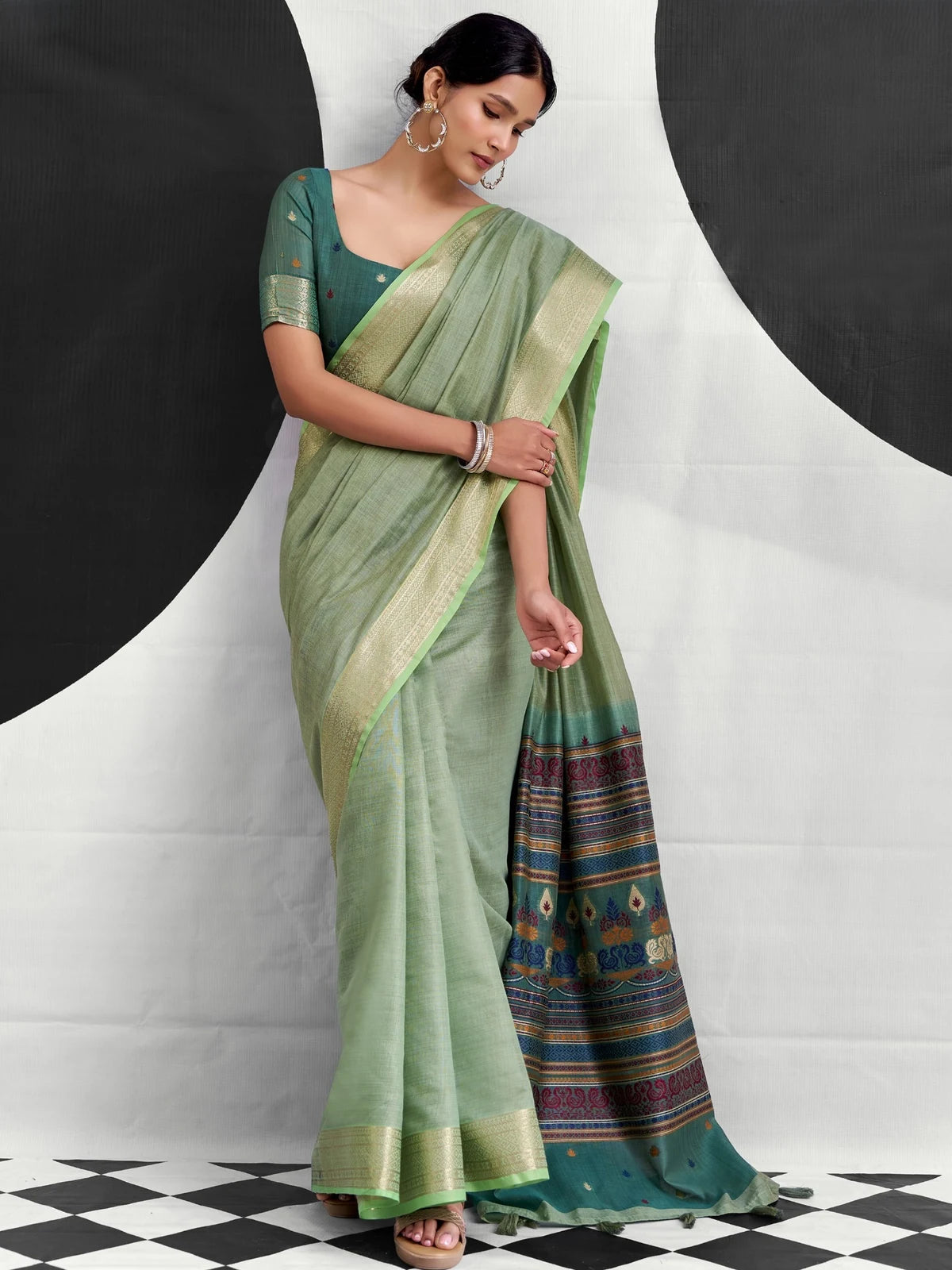 Tarani green Cotton Modal saree front pose highlighting woven pallu