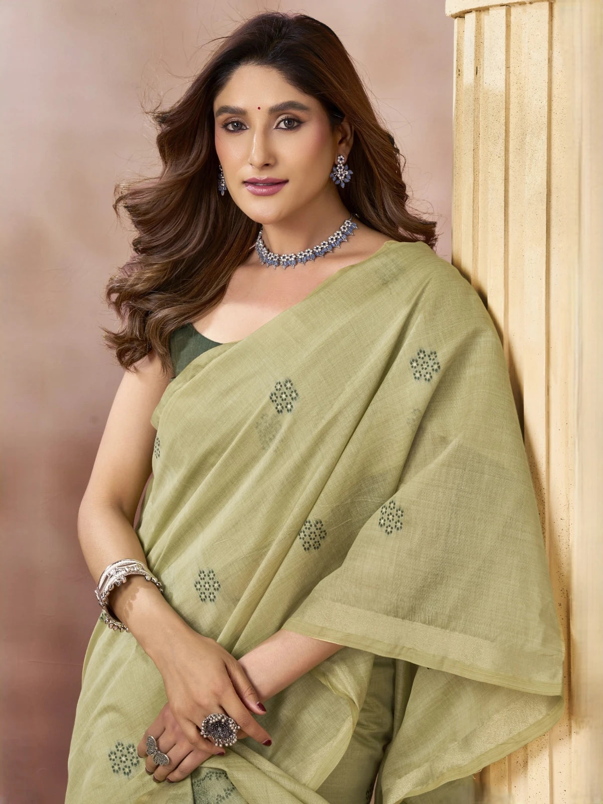 Tarani Chahna green cotton saree with tassels in elegant upper body view