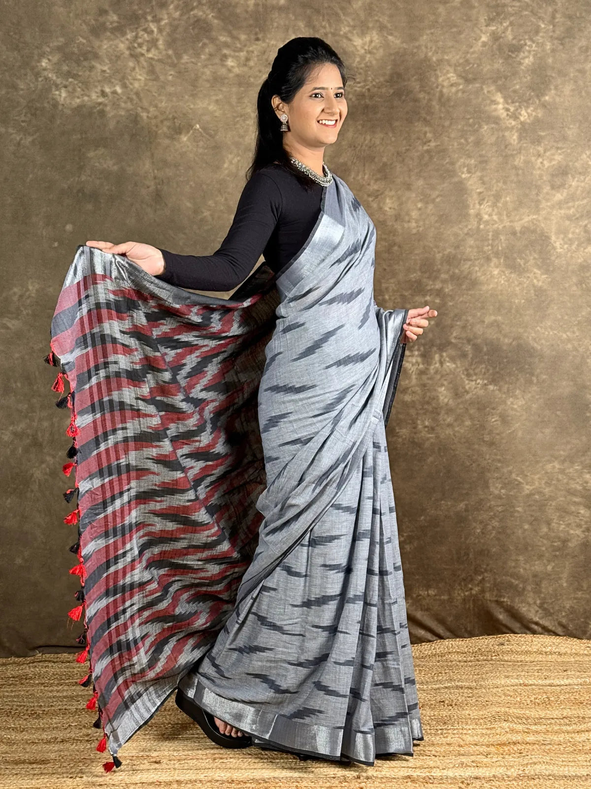 Tarani premium grey woven silk saree full view with elegant festive drape