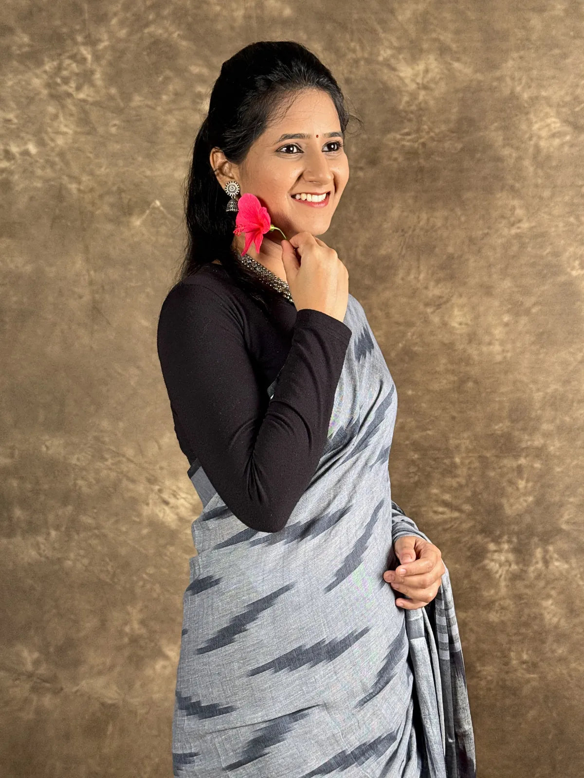 Tarani grey woven silk saree upper body view styled with jewelry