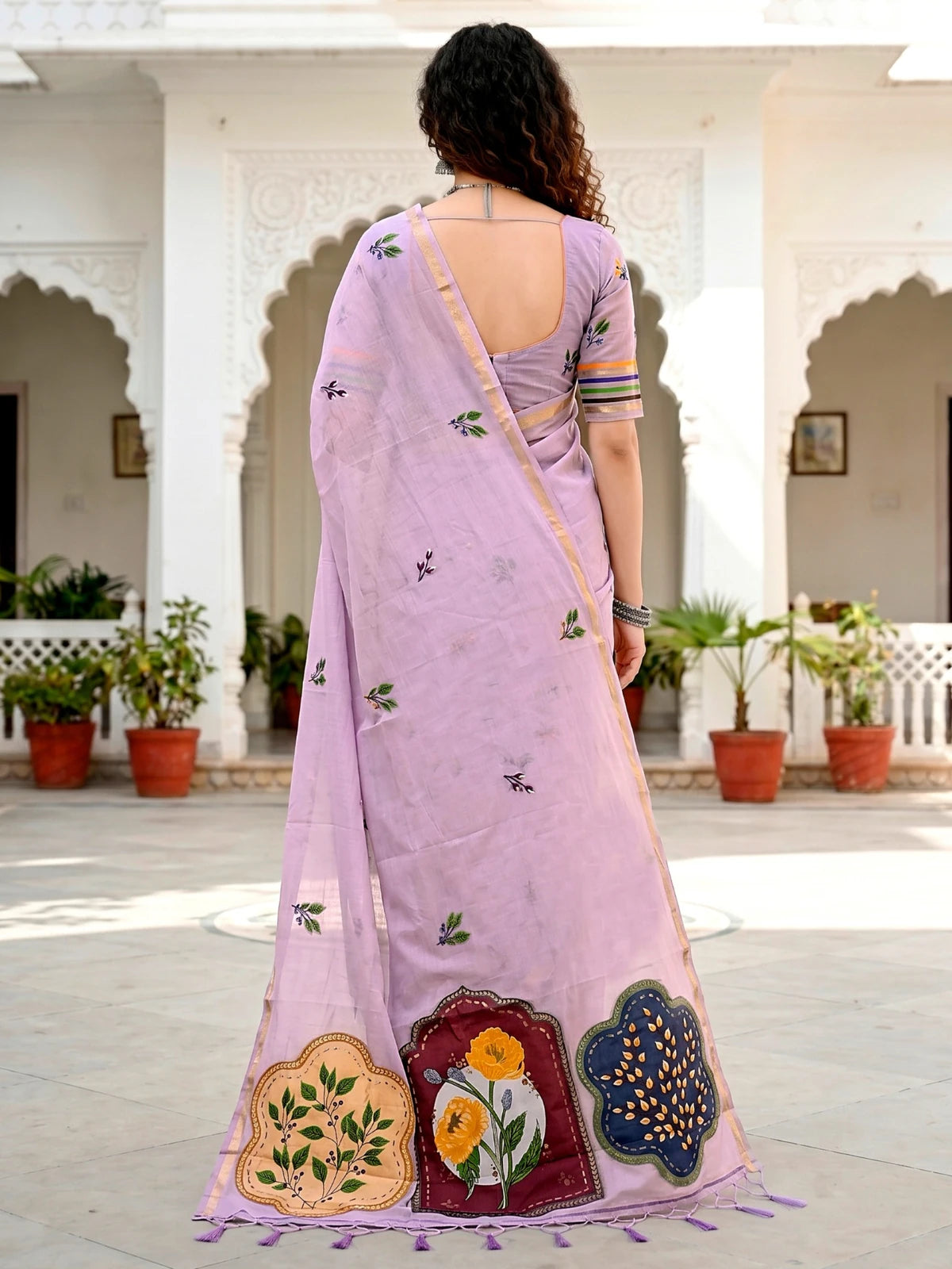 Tarani lavender cotton saree back view displaying floral woven design and pallu