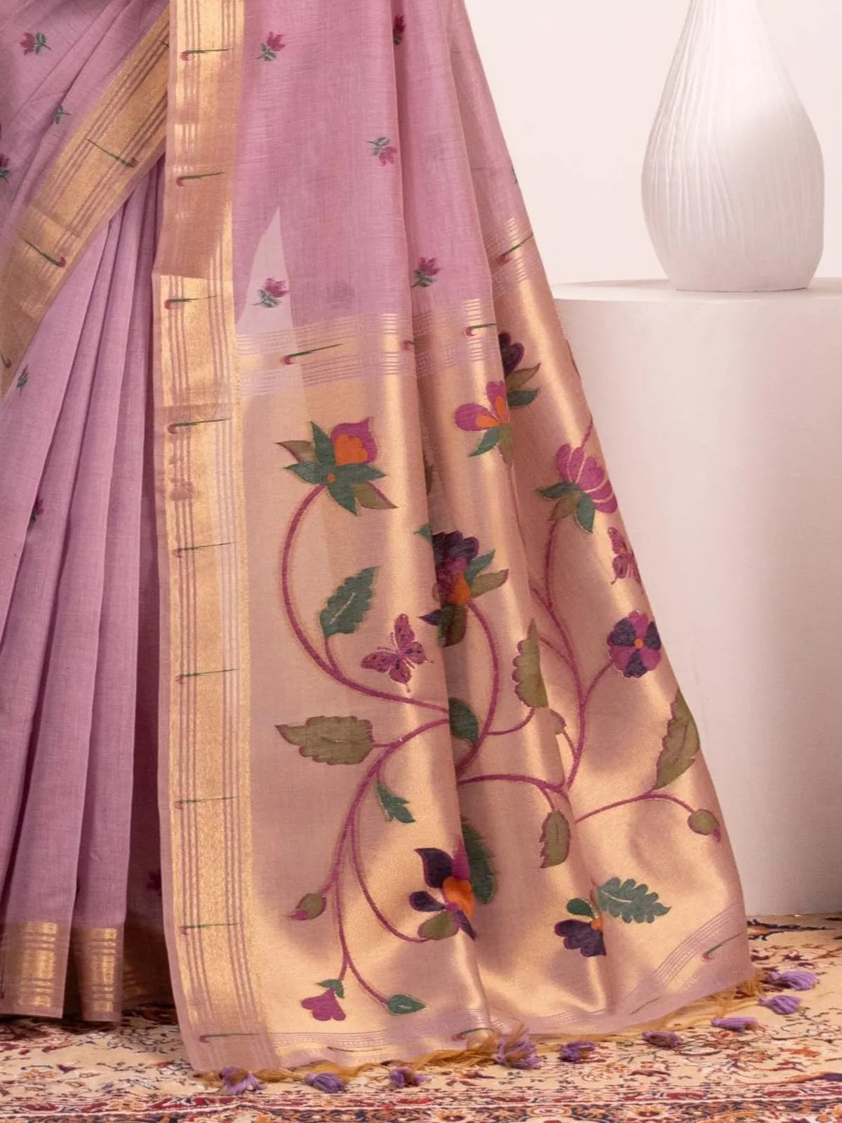 Tarani lavender paithani saree pallu close-up showing rich floral resham design and zari detailing