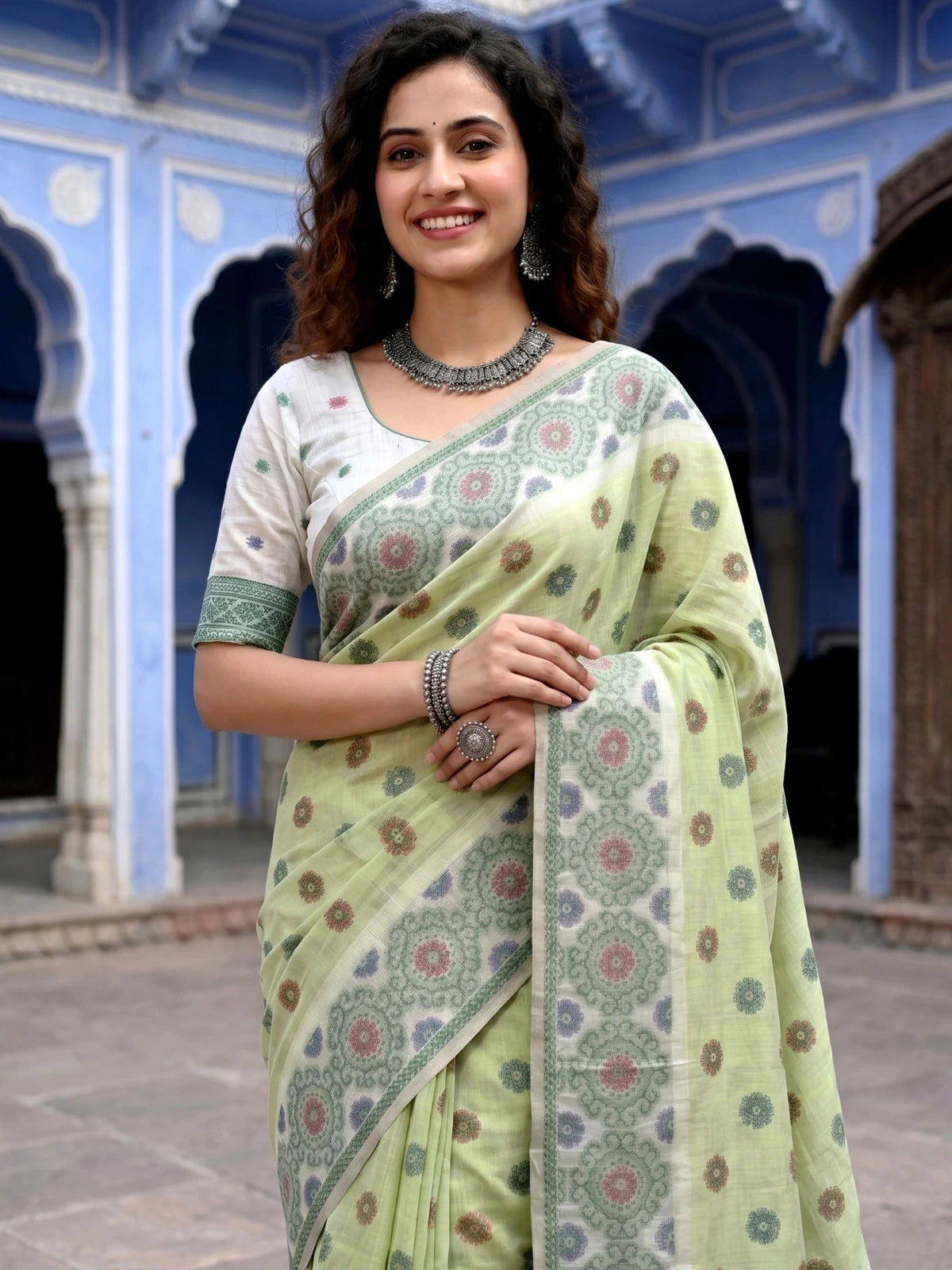 Tarani light green cotton printed saree with blouse piece upper body view Gopika