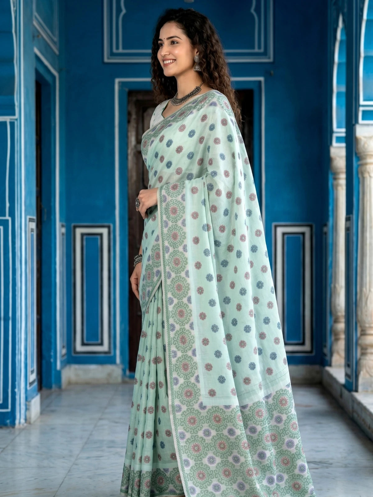 Tarani mint green printed cotton saree side view with blouse piece