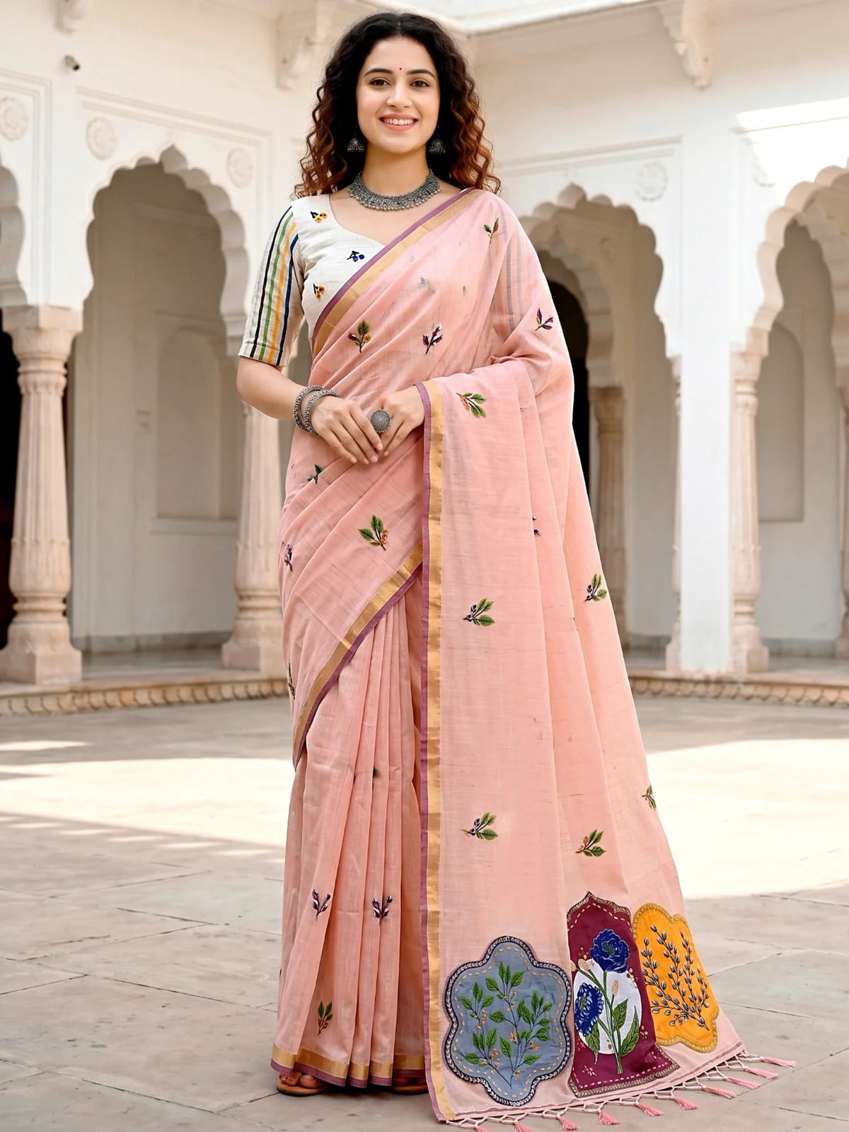 Tarani Nehika peach cotton saree full view with woven floral work and contrast border