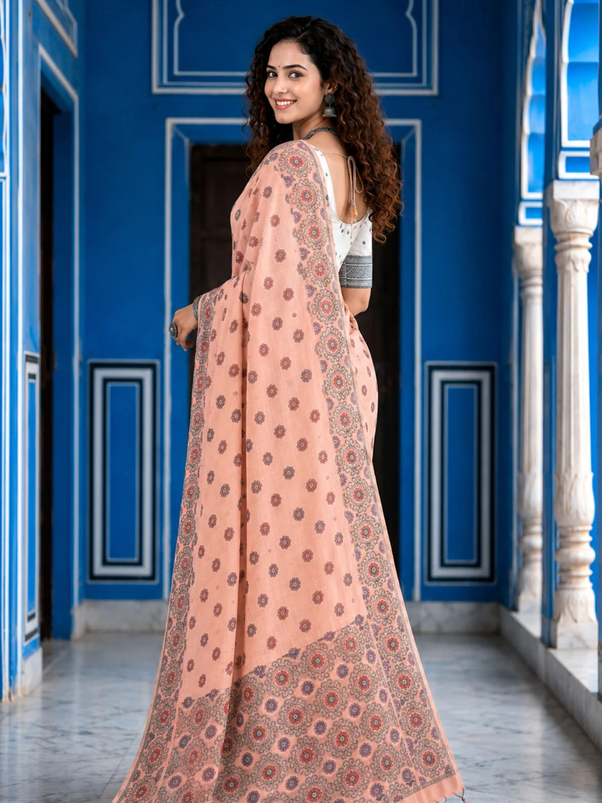 Tarani peach cotton printed saree with blouse piece side view