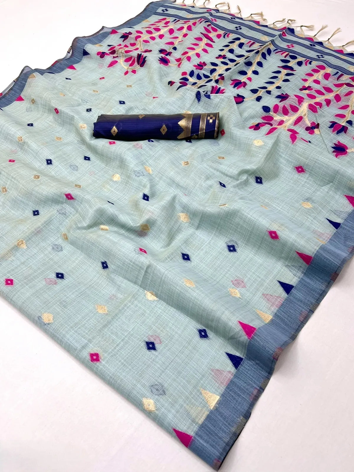 Tarani sky blue soft cotton Jamdani style weaving saree flat lay with blouse piece