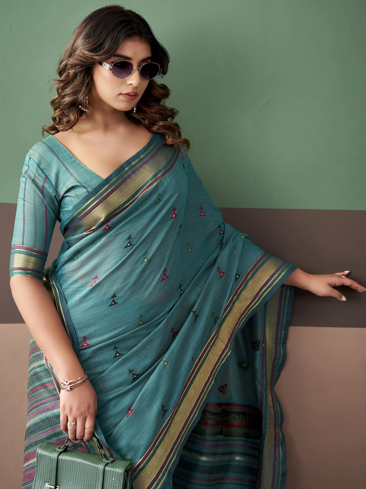 Tarani teal premium cotton weaving saree upper body view showing border details