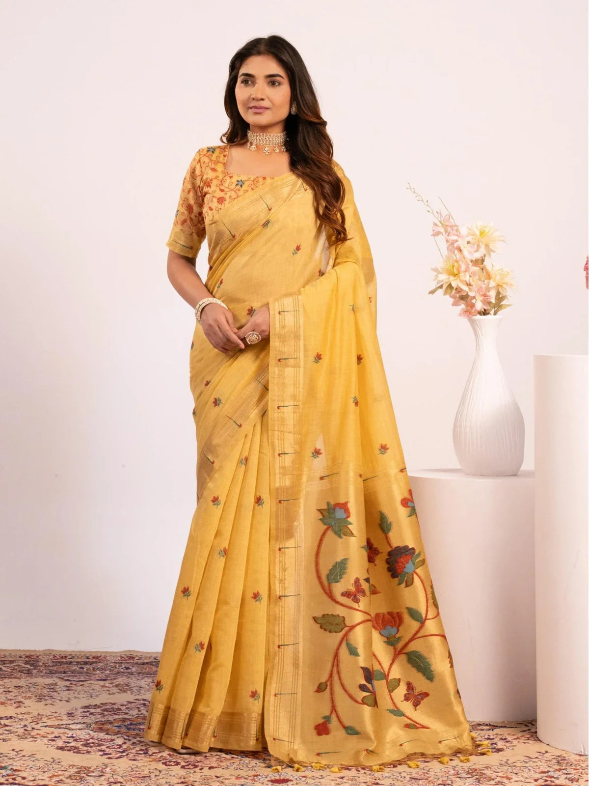 Tarani premium yellow moga cotton paithani saree with floral woven pallu front view