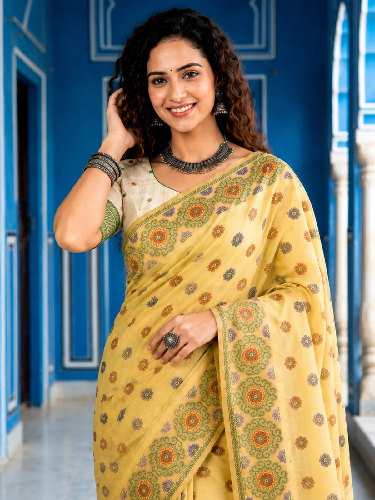Tarani yellow cotton printed saree upper body view showing border