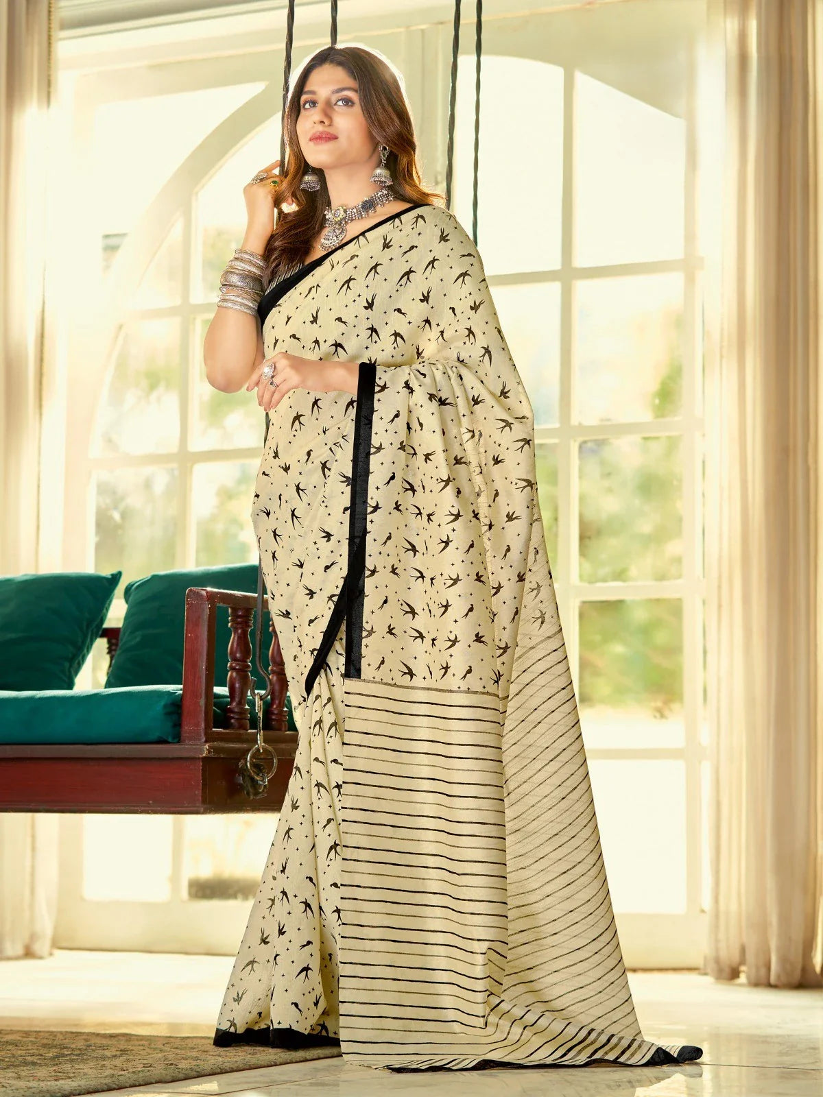 Tarani beige cotton silk saree with black border and bird print for festive and office wear