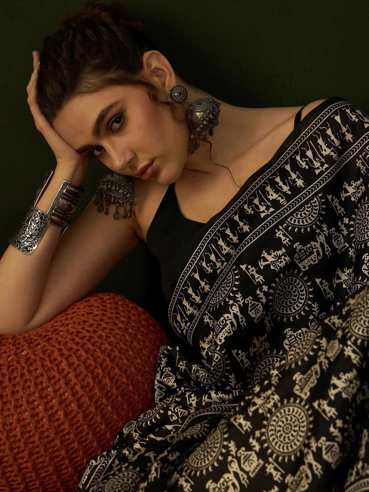 Tarani black cotton silk saree artistic close-up with tribal pattern