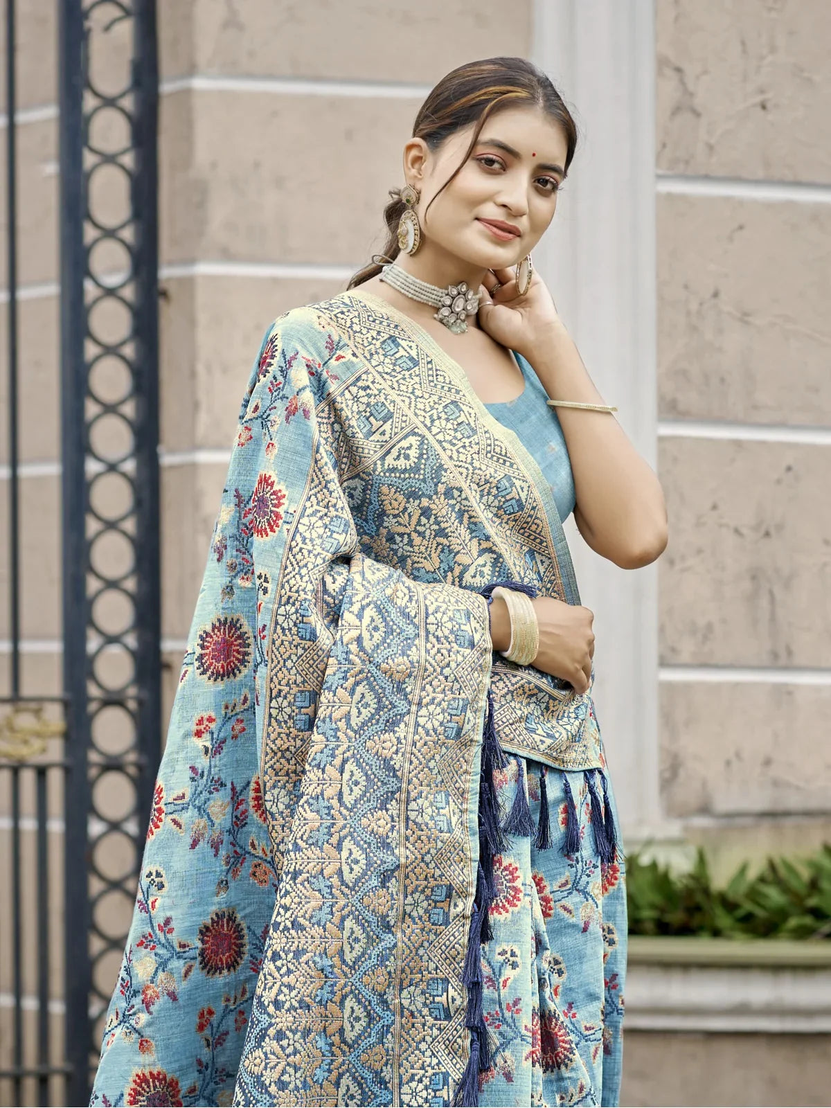 Tarani blue cotton silk saree upper body view showing elegant floral pattern and blouse design