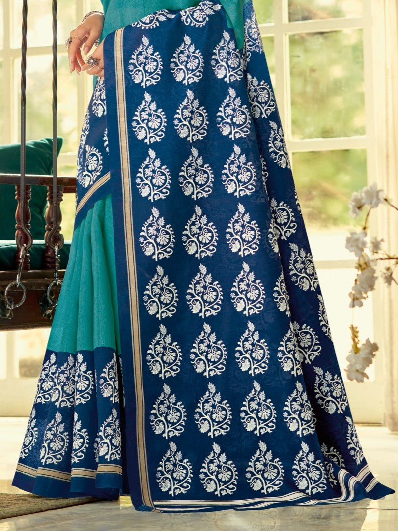 Tarani cotton silk saree pallu close-up showing detailed white motifs on blue base