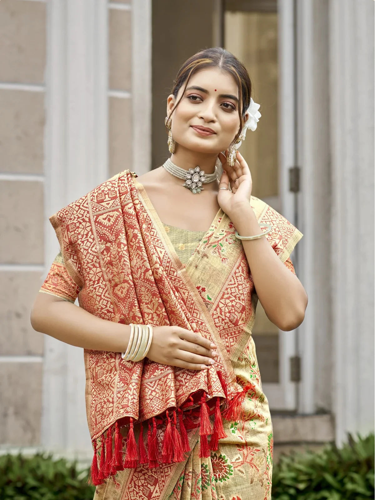 Tarani upper body view of cotton silk green saree with red border and meenakari blouse