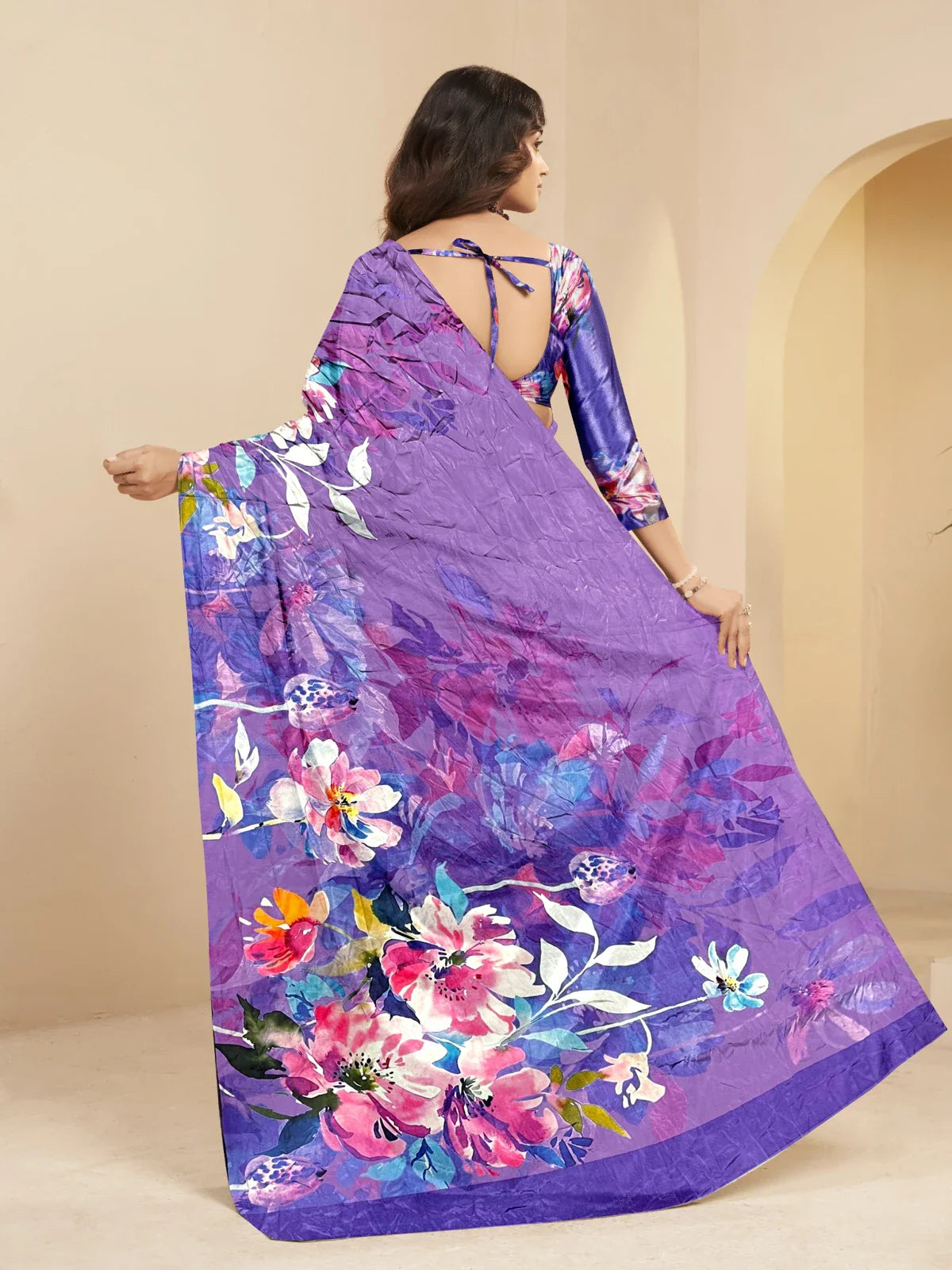 Tarani purple saree back view showing blouse and floral pallu