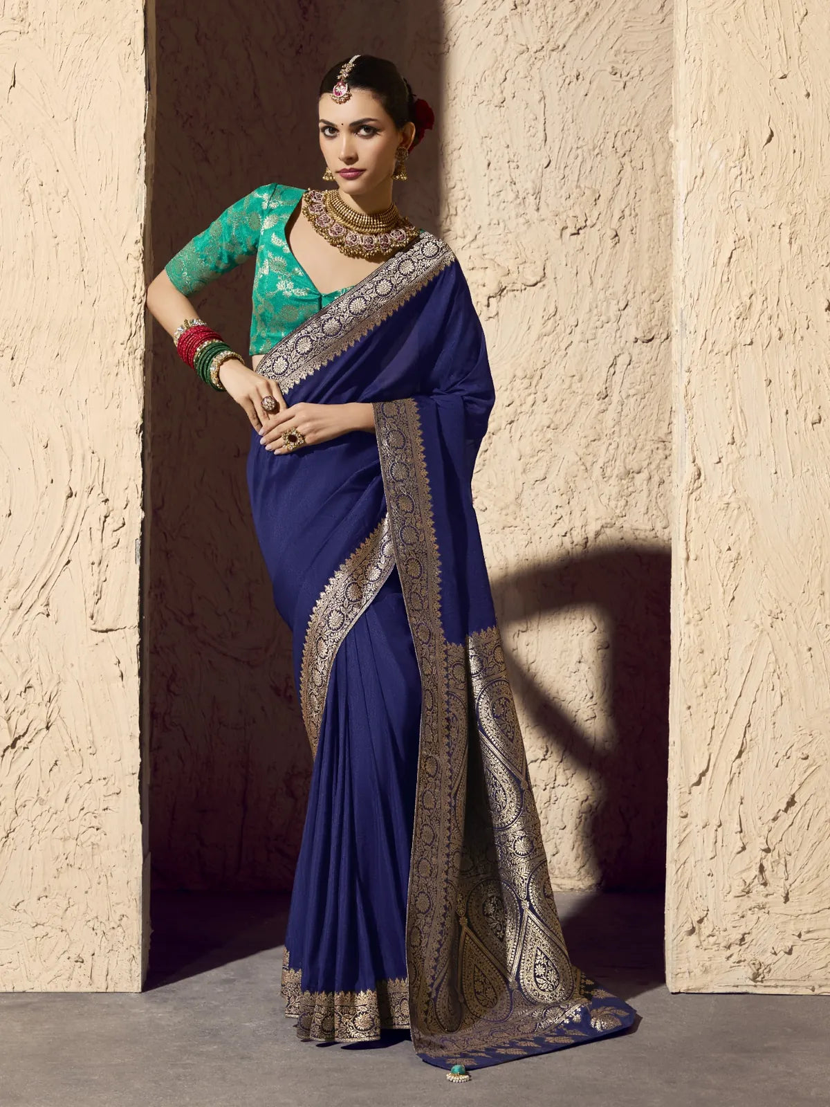 Tarani navy blue crepe georgette saree with zari border and matching blouse – full view