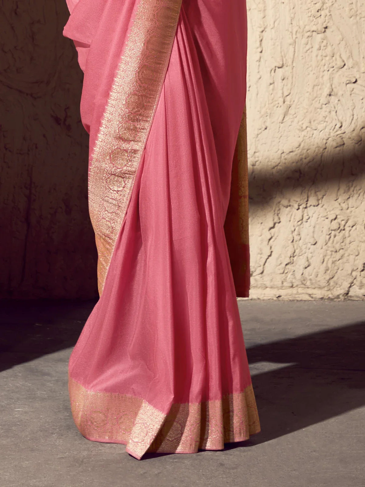 Tarani pink saree with delicate zari border fabric texture close-up in crepe georgette material
