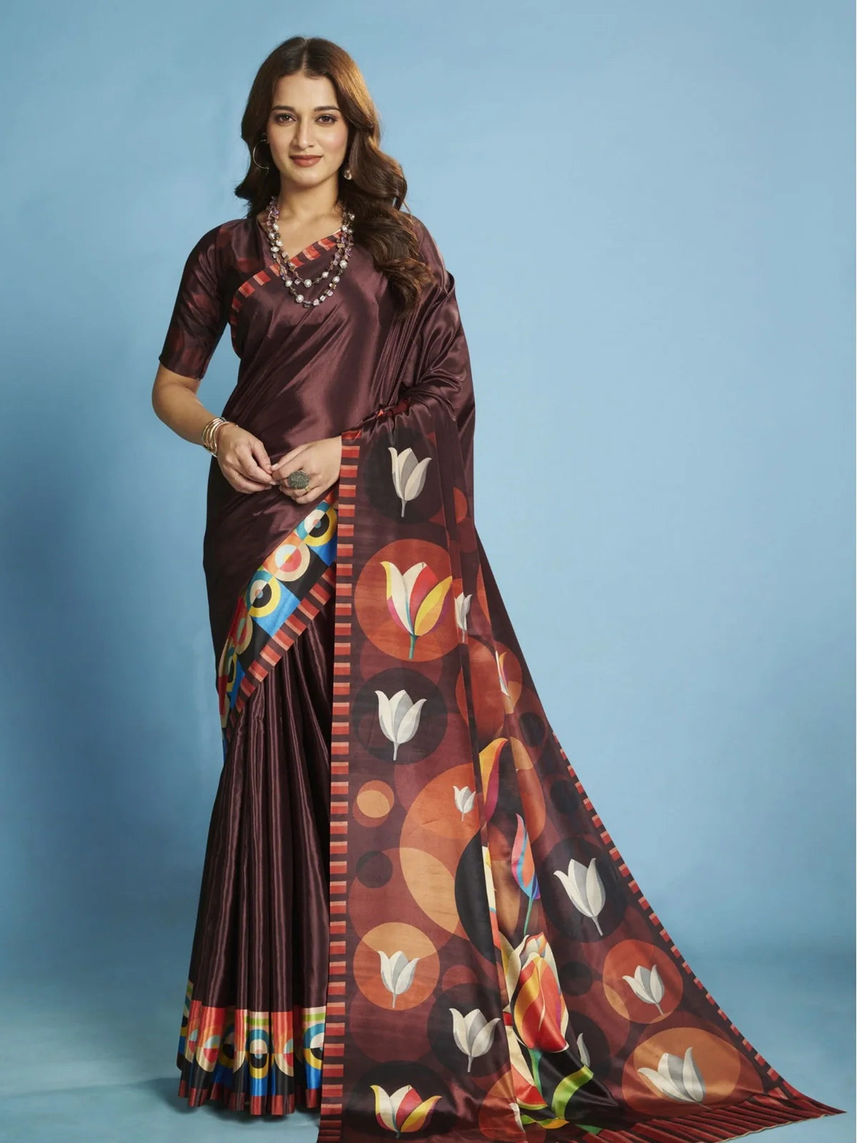 Tarani party wear brown crepe silk saree with geometric floral pallu and colorful border full view