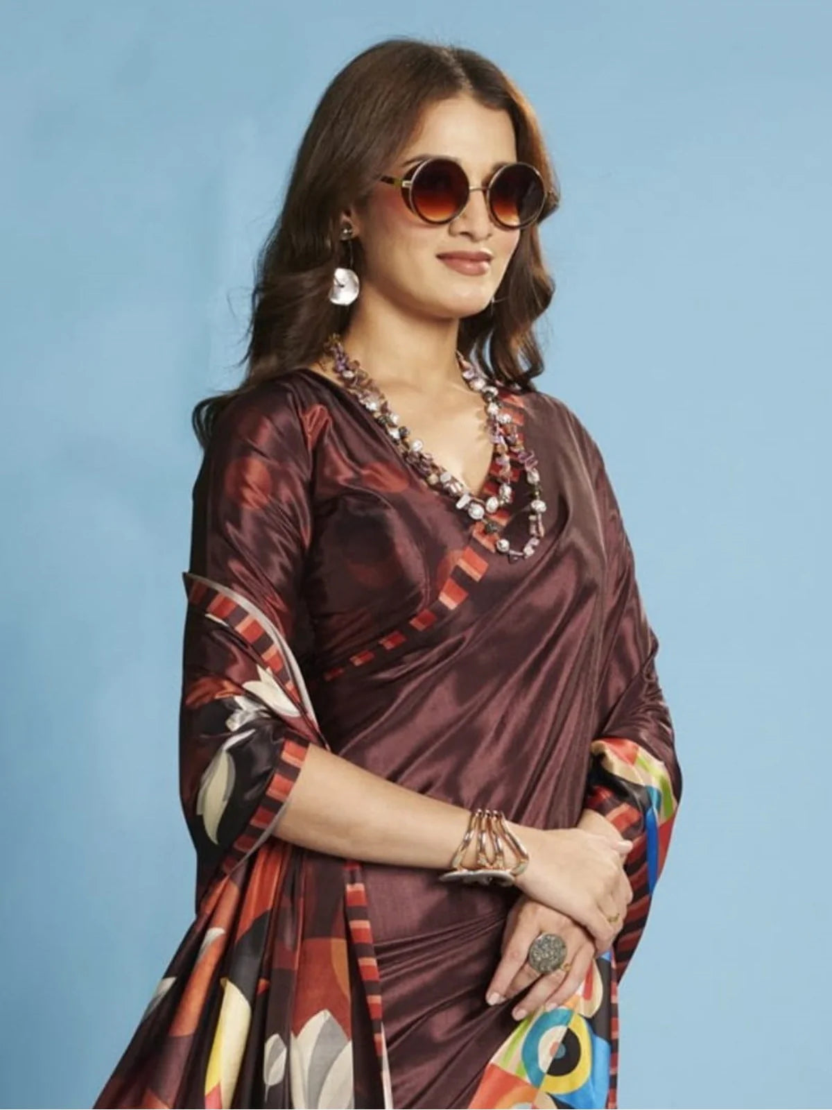 Tarani brown crepe saree with colorful work and round sunglasses look – upper body view