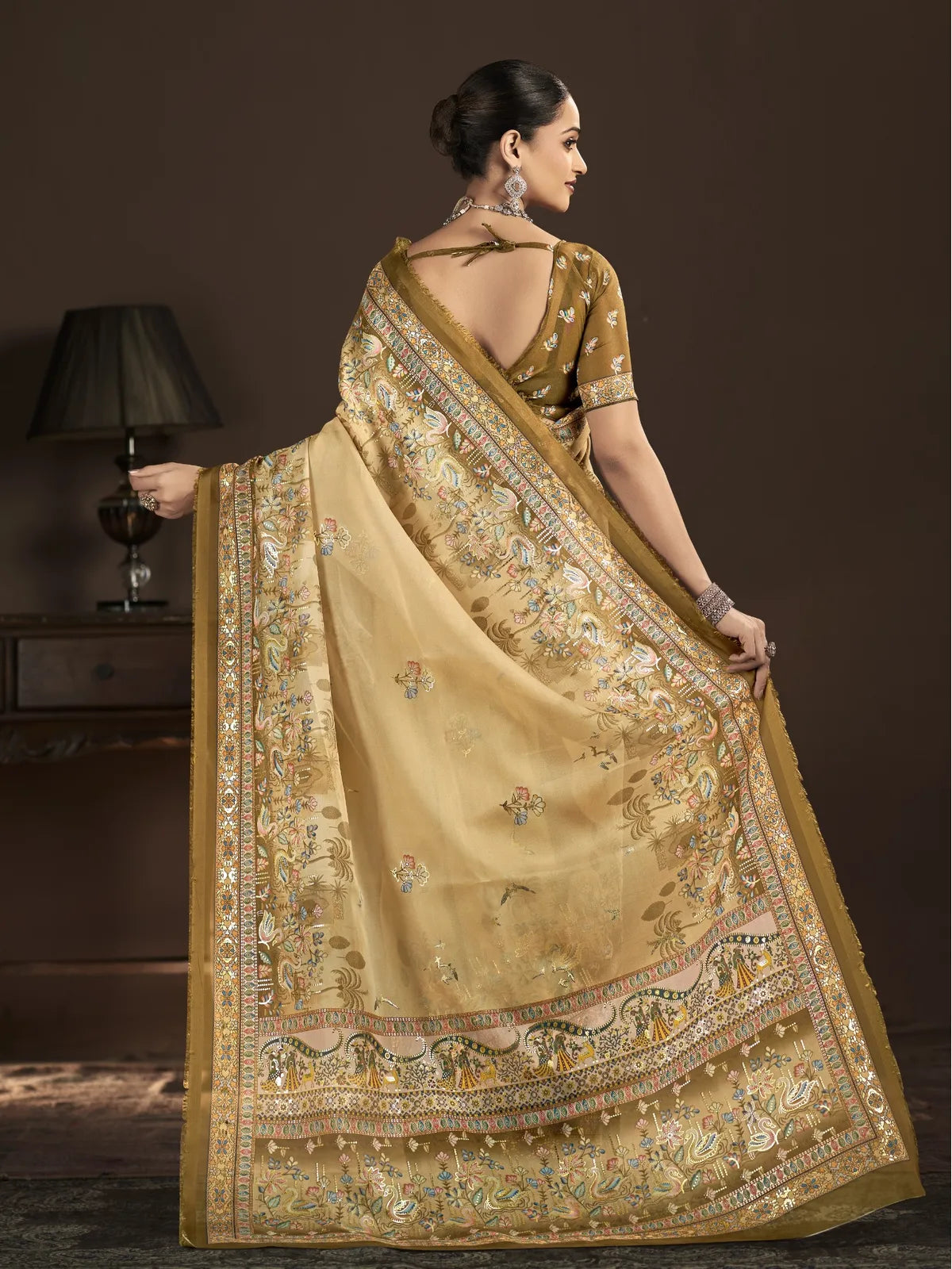 Tarani golden crepe saree back view with open back blouse design and saree fall