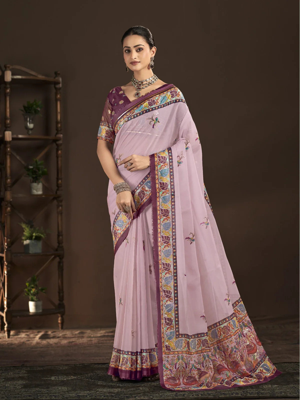 Tarani premium pink crepe silk saree with foil print border and matching blouse in full view