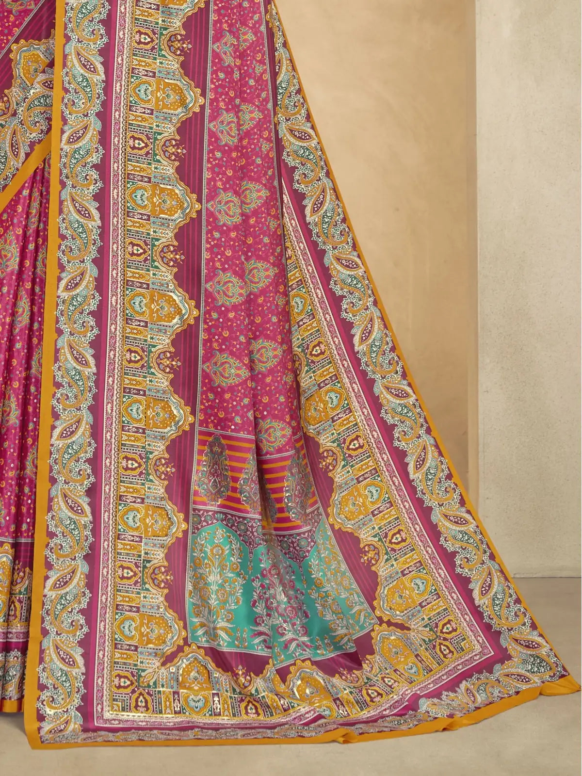 Tarani pink saree pallu view with foil position print and vibrant border