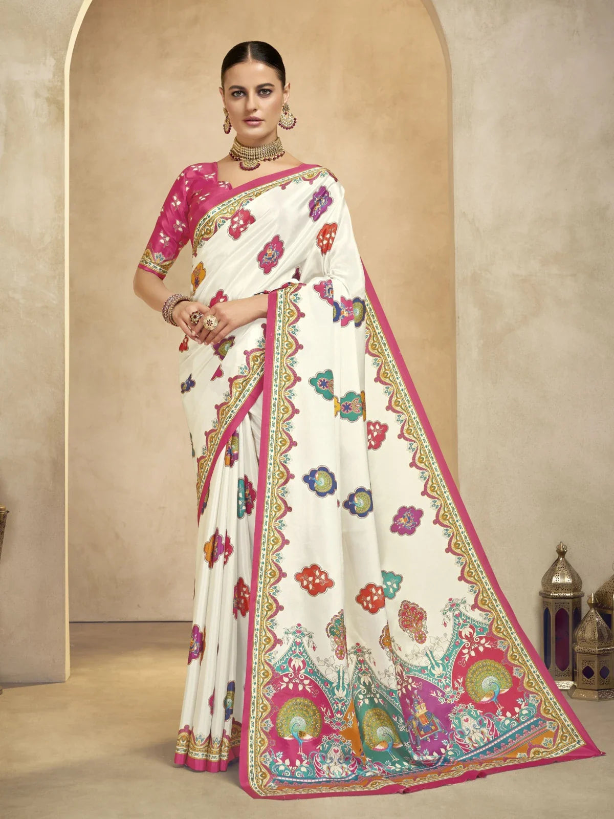 Tarani white crepe saree with multicolor foil and digital print paired with pink designer blouse for festive occasions