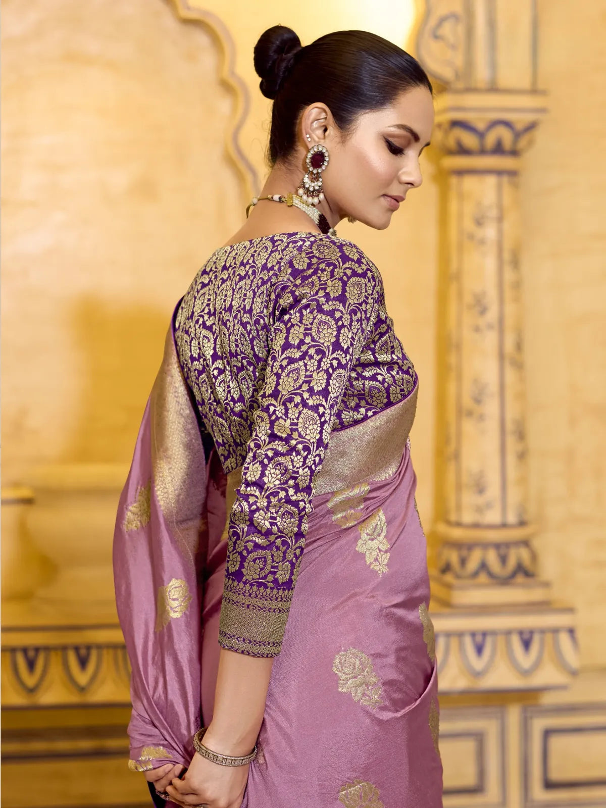 Tarani blouse view showing intricate zari embroidery on purple contrast blouse