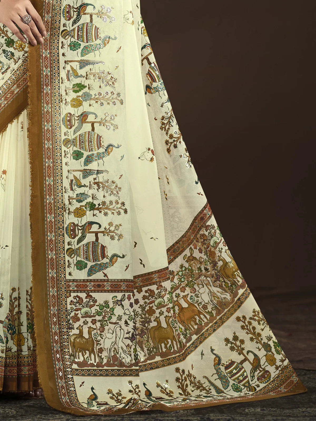 Tarani closeup of elegant digital foil print on premium crepe silk fabric showing detailed pallu