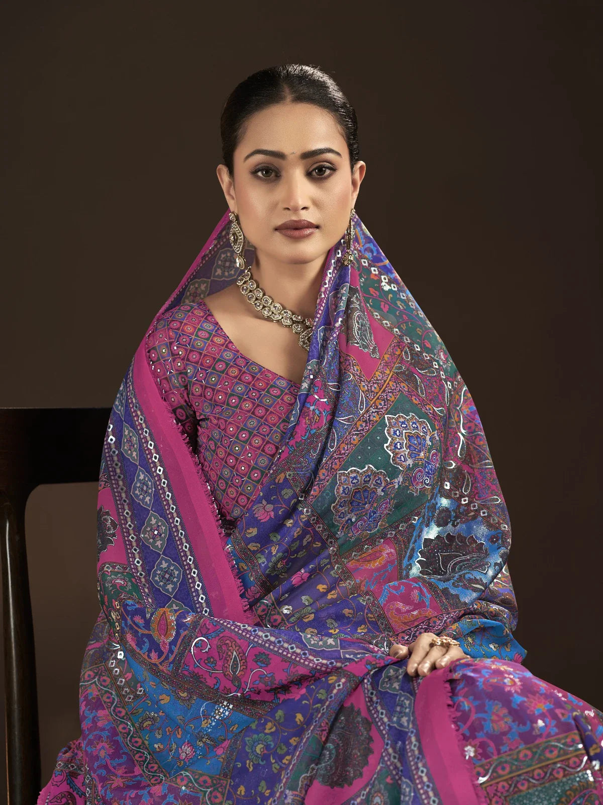 Tarani elegant upper body close view of crepe silk purple saree with mirror detailing and blouse