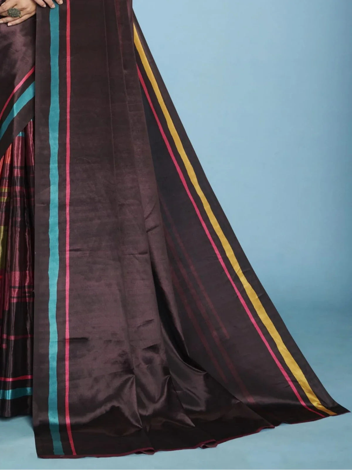 Tarani crepe silk wine saree pallu view with colorful stripe border and rich festive texture