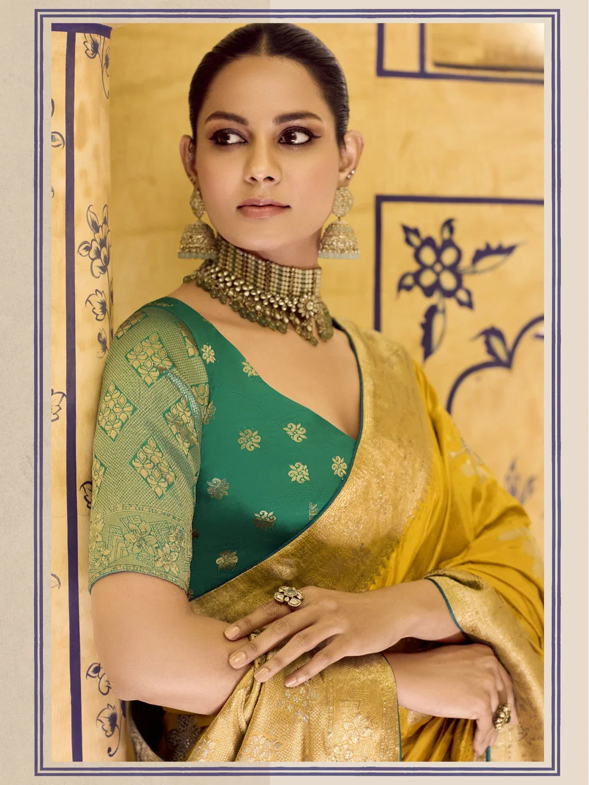 Tarani mustard yellow crepe silk saree with zari weaving pallu and detailed floral border view