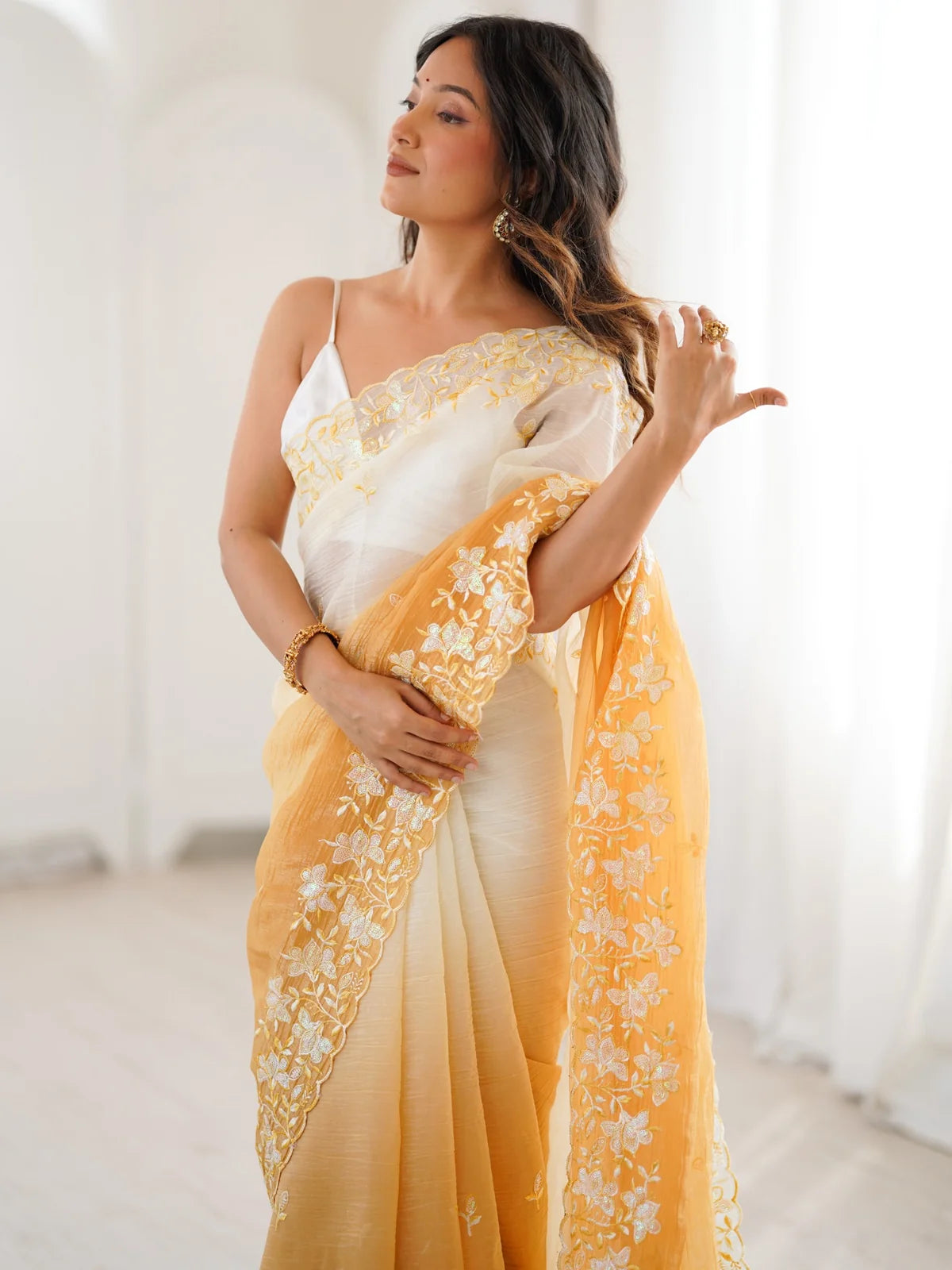 Tarani Geetali mustard saree pallu view with detailed sequence embroidery border by Tarani