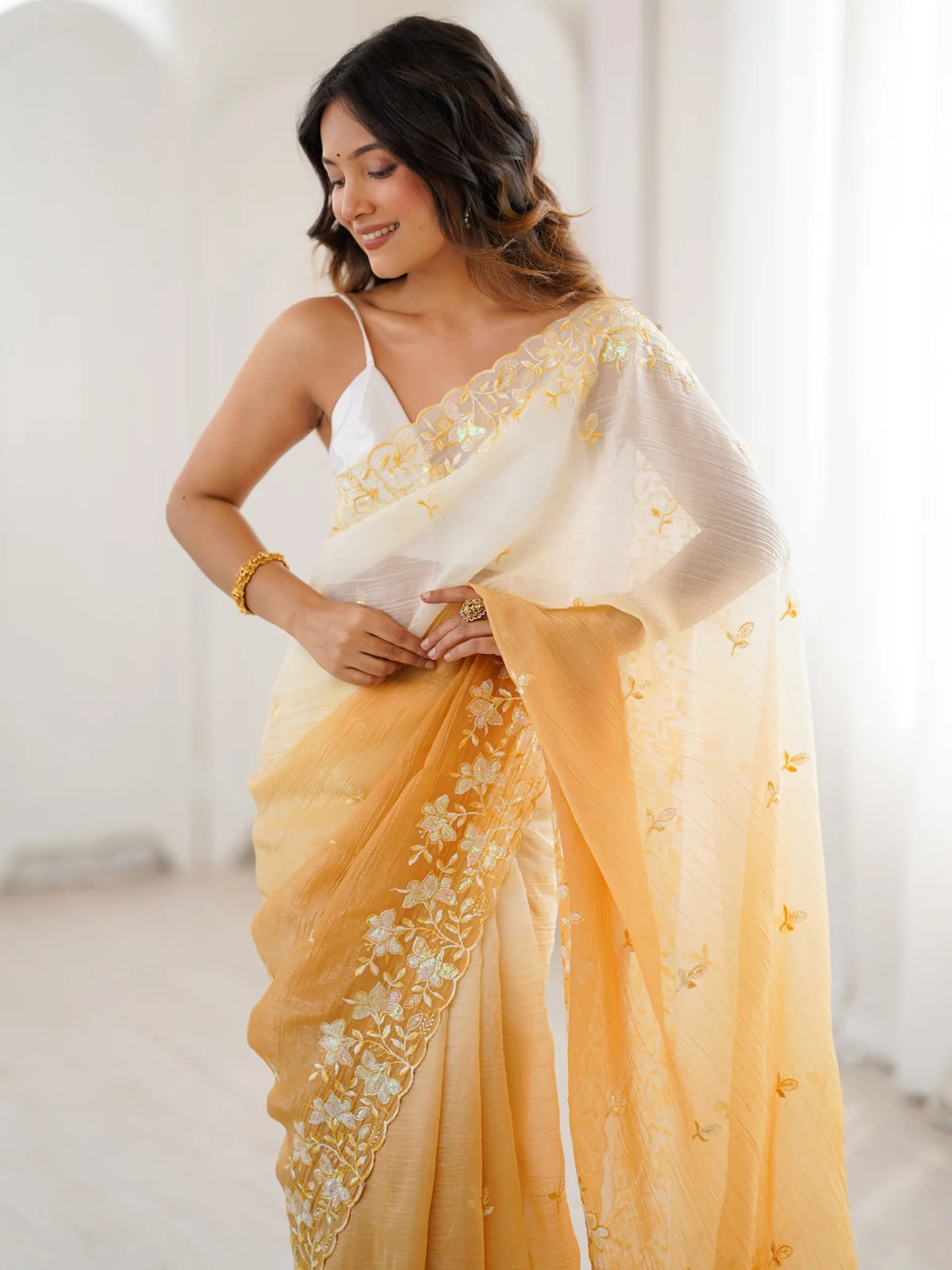 Tarani Geetali mustard crunchy saree upper body view with embroidered border and elegant drape