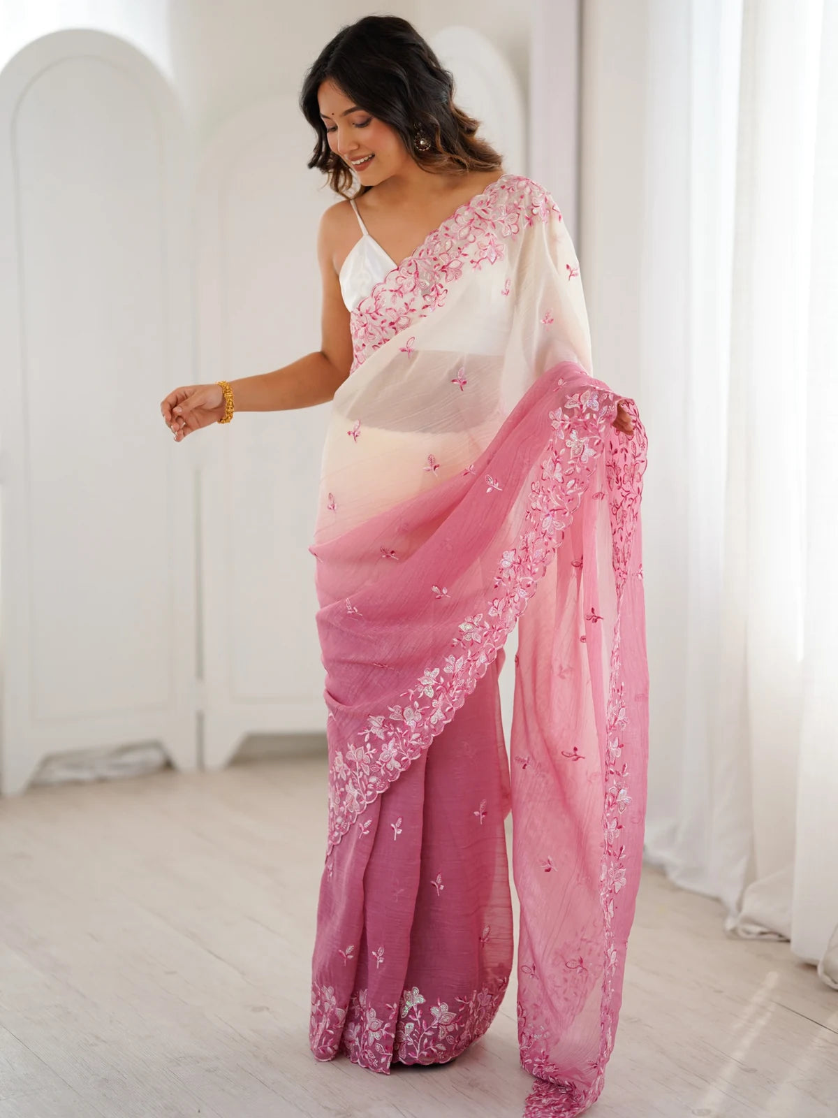 Tarani pink crunchy saree side view with delicate sequence embroidery and flowing pallu