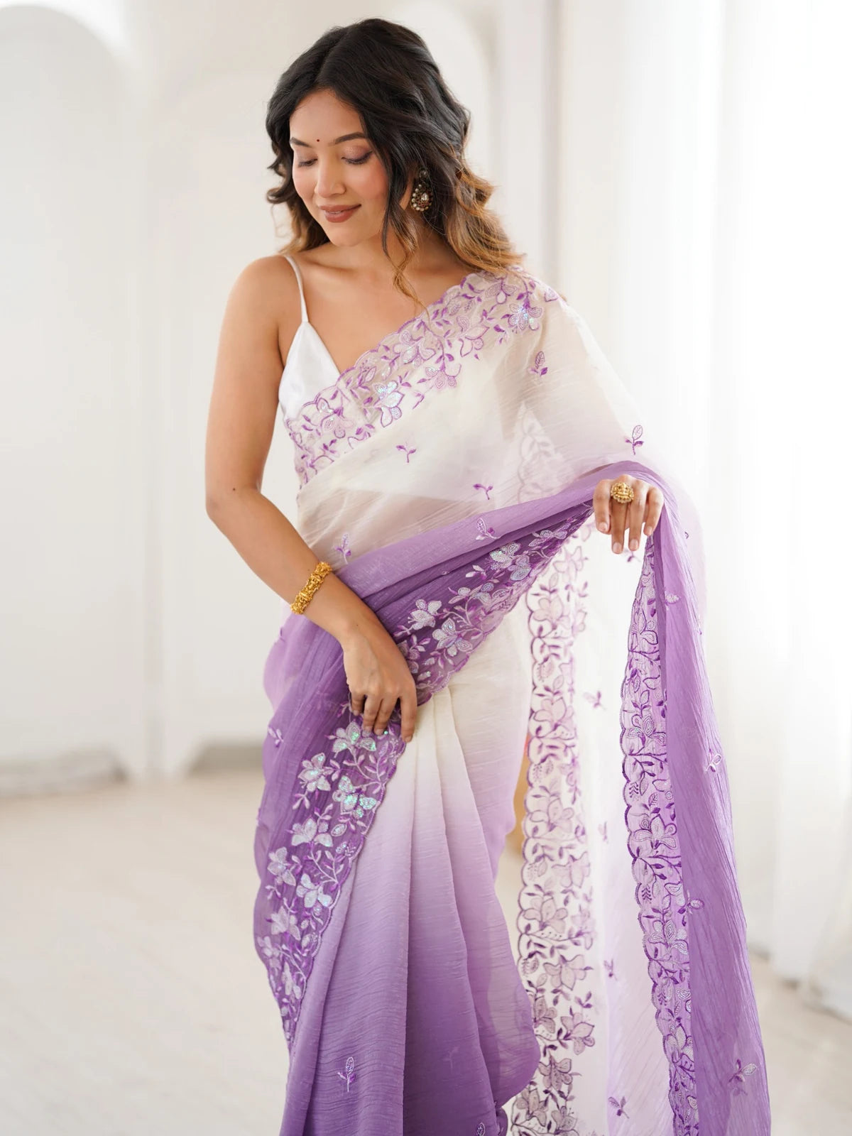 Tarani Sonali purple crunchy saree front view with embroidered border and elegant festive drape