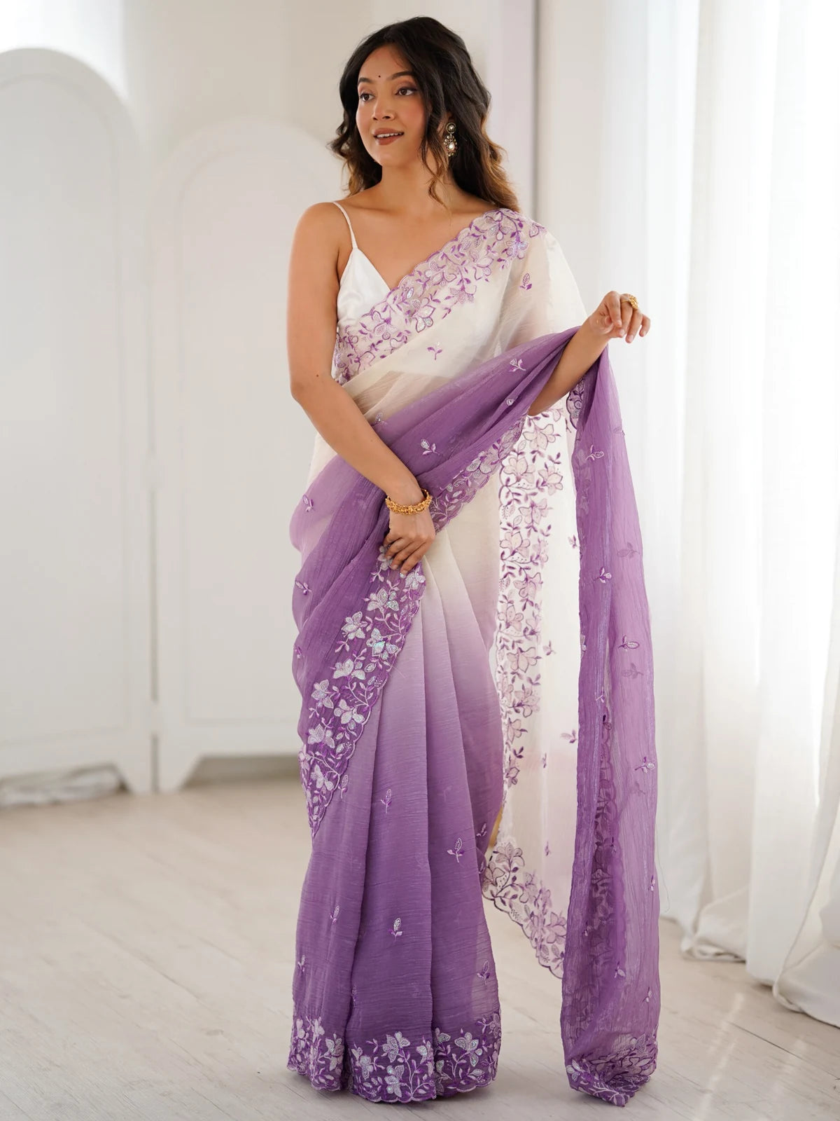 Tarani Sonali purple crunchy saree pallu view with floral sequence embroidery border and festive styling