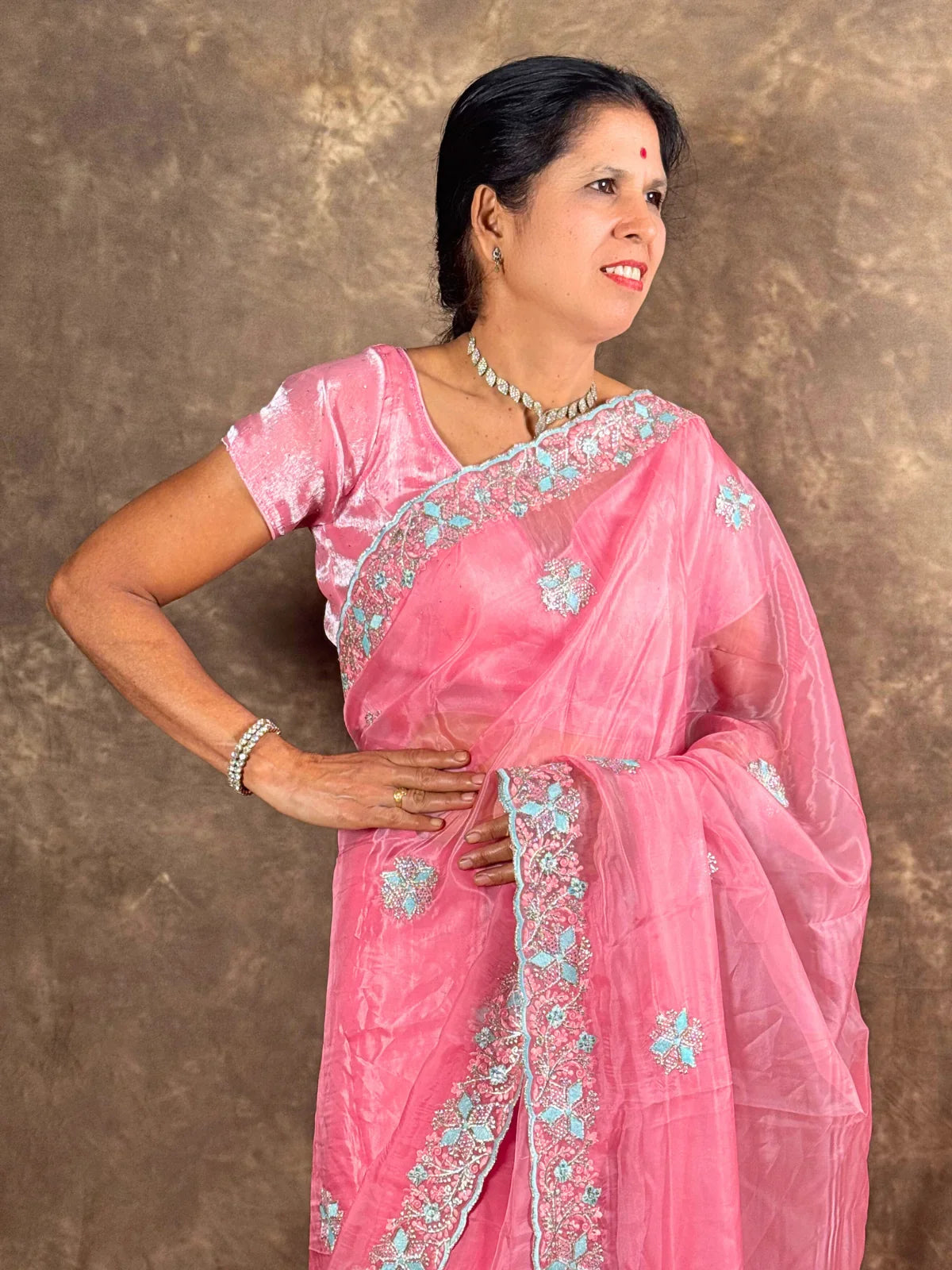 Tarani crystal silk saree pink upper view with designer embroidery and cutdana highlights