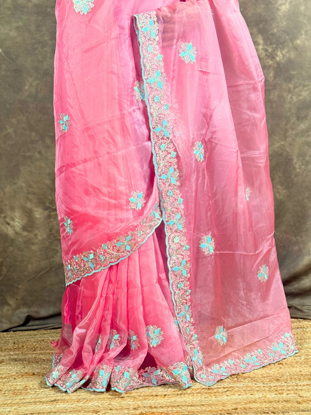 Tarani pink saree close-up view showing delicate crystal silk embroidery work
